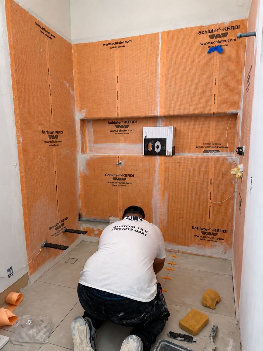 Curbless shower with Schluter-Kerdi waterproofing membrane during install